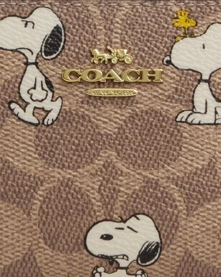 Coach X Peanuts Snap Wallet In Signature Canvas With Snoopy Print CBN32