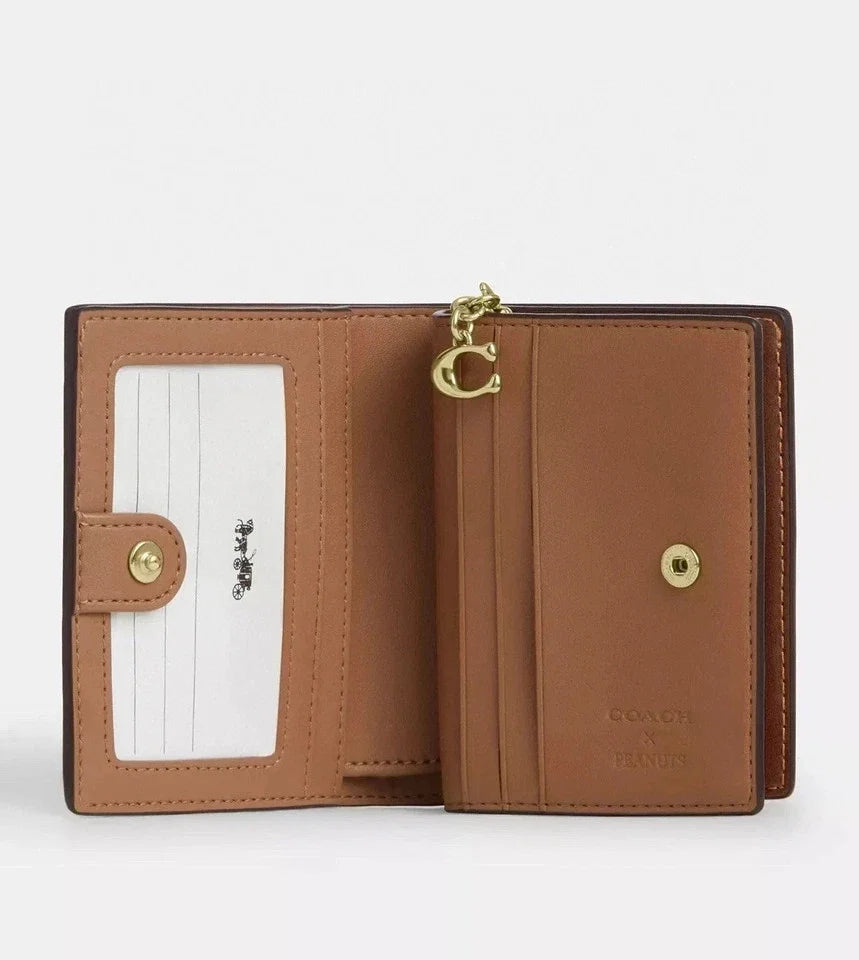 Coach X Peanuts Snap Wallet In Signature Canvas With Snoopy Print CBN32